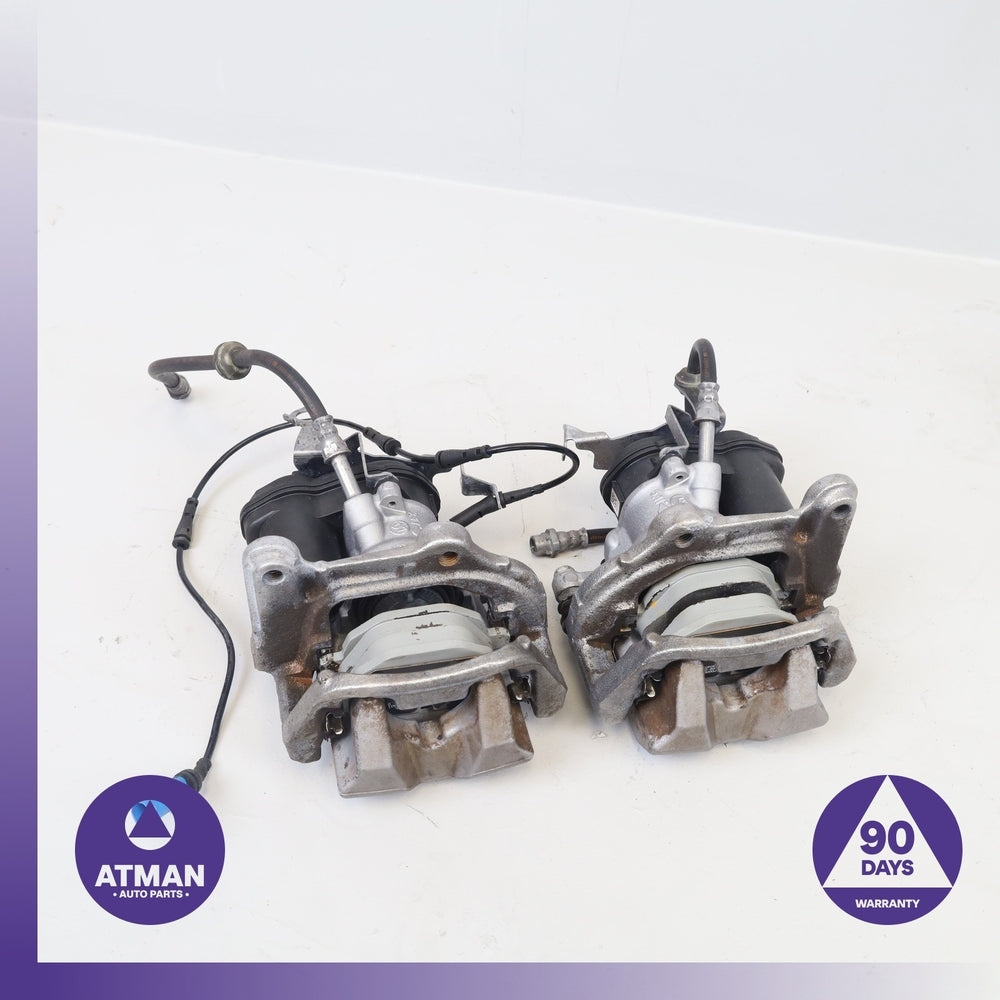 17-24 BMW G30 530e X3 Rear Left & Right Side Brake Caliper Set w/ Actuator OEM