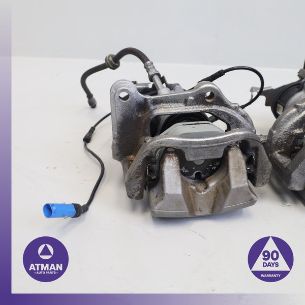 17-24 BMW G30 530e X3 Rear Left & Right Side Brake Caliper Set w/ Actuator OEM