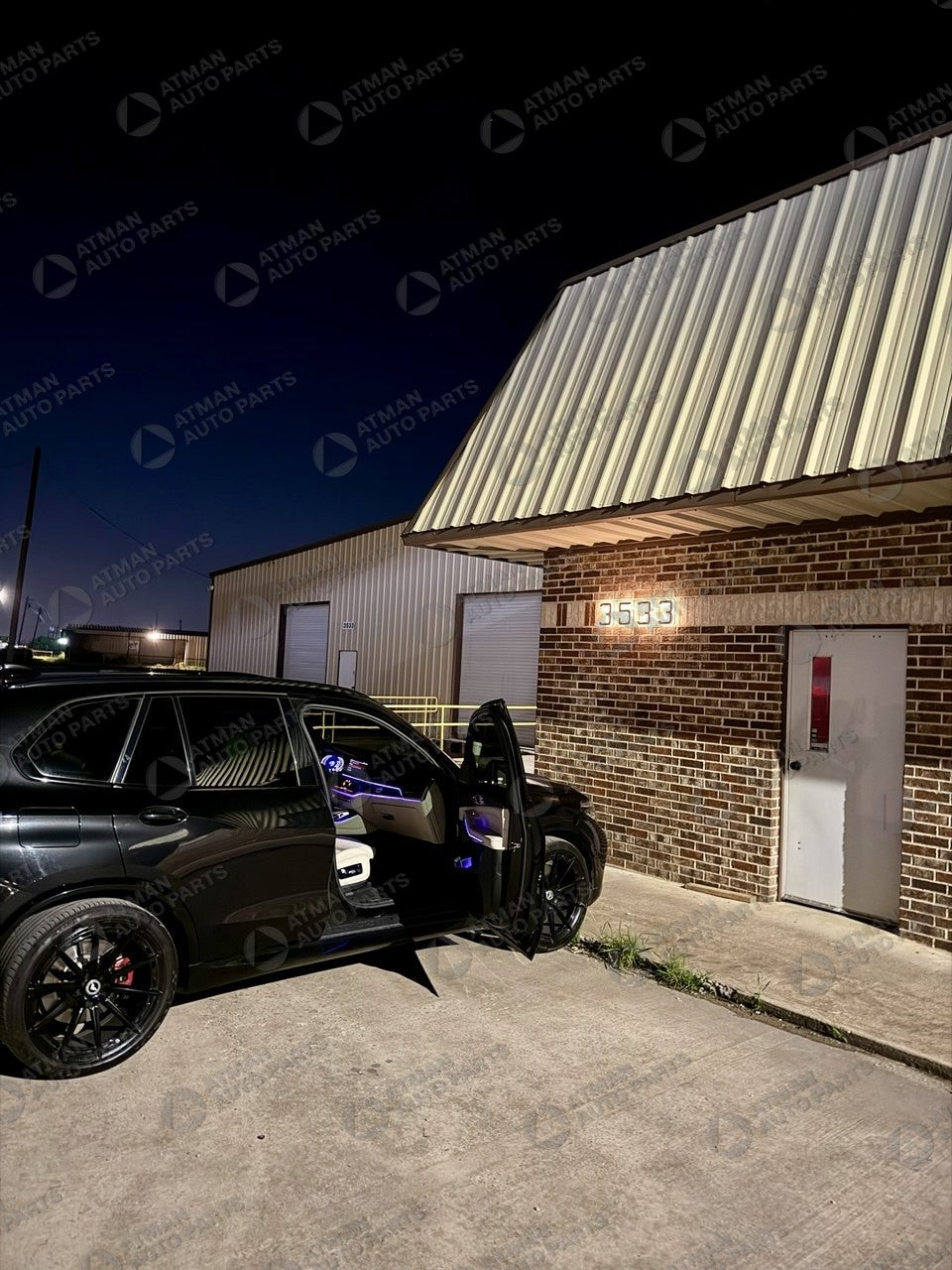 Entrance to the Atman Auto Parts building in Kaufman, Texas